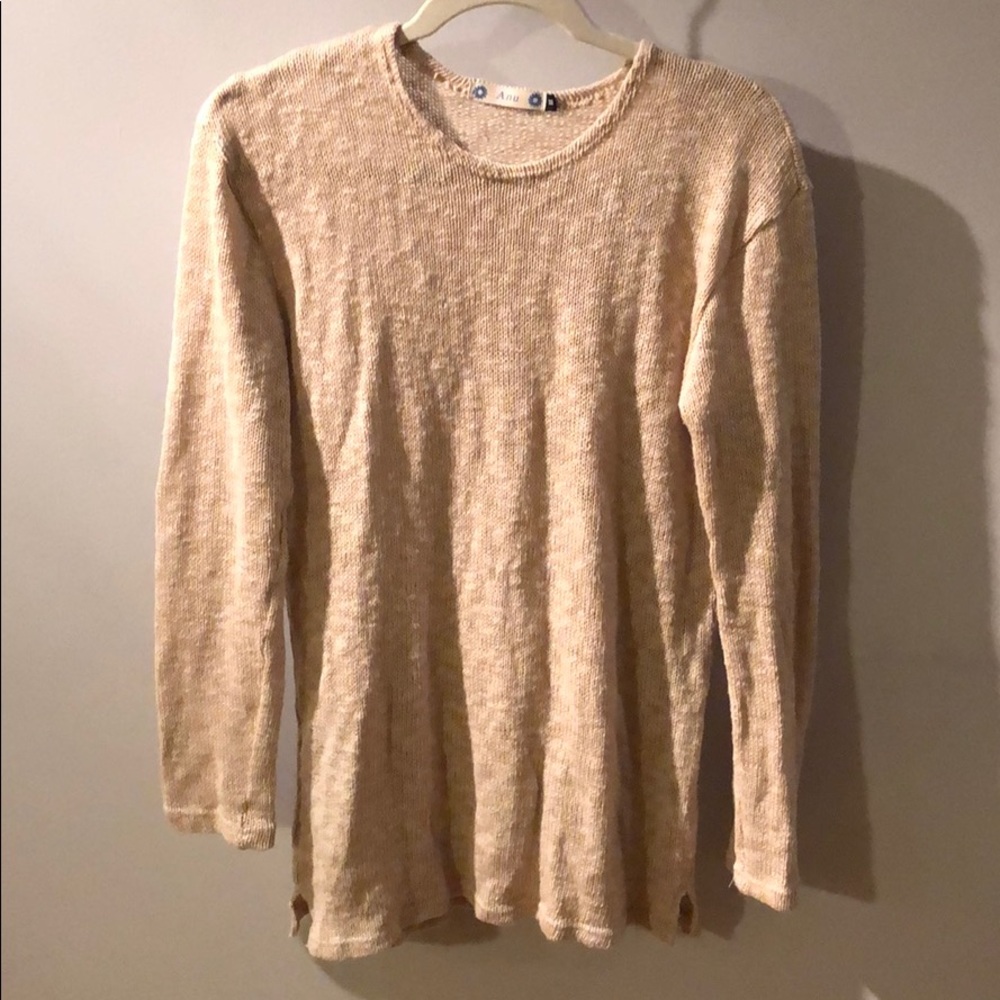 A tan sweater
